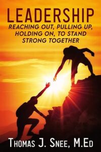 The front cover of Leadership: Reaching Out, Pulling Up, Holding On, To Stand Strong Together by Thomas J. Snee